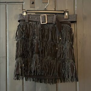 NWT. Black rhinestone mini skirt.